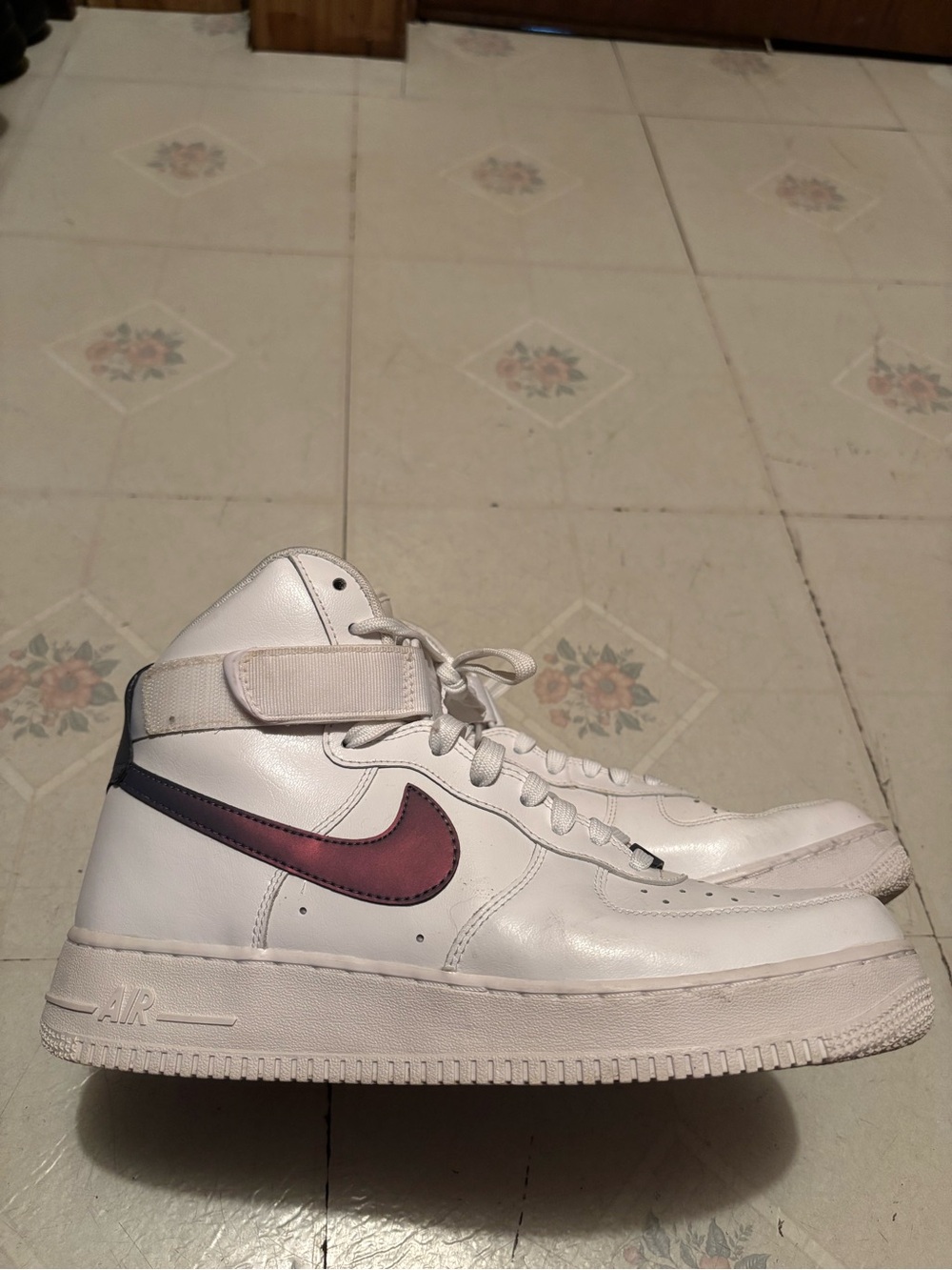 Nike White High-Top Sneakers with Iridescent Maroon Swoosh